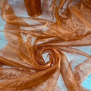 1m burnt orange sheen organza fabric 58”wide