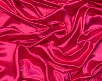 Tecido crepe de cetim rosa choque de 1 m com 58” de largura