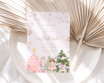 May include: A pink and gold invitation card with the text "We can't wait to celebrate Two". The card features watercolor illustrations of a Christmas tree, a nutcracker, a ballerina, and a unicorn. The invitation is for a second birthday.