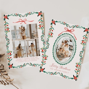 May include: Two Christmas cards with family photos, adorned with watercolor illustrations of holly and red bows. One card features two photos, the other an oval photo. Text includes "Warmest wishes" and "Merry Christmas".