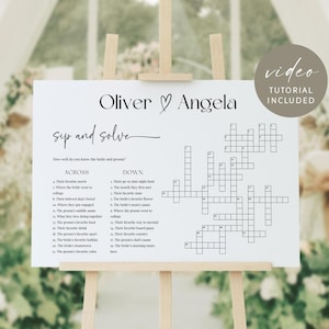 Może przedstawiać: Biały znak na drewnianym sztaludze z imionami "Oliver & Angela" i tekstem "sip and solve". Znak zawiera krzyżówkę z wskazówkami dotyczącymi pary młodej, a także dołączony jest samouczek wideo.