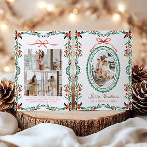 May include: Christmas card with family photos, featuring a watercolor design of green leaves, red berries, and a red bow. The card includes the text "Merry Christmas" and "Warmest wishes from our growing family to yours for a happy holiday season."