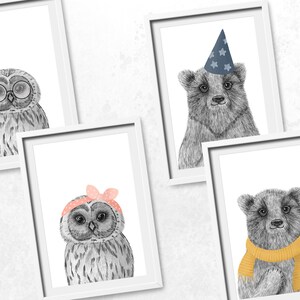 May include: Set of five framed art prints featuring adorable animal illustrations. Includes a gray owl wearing glasses, a bear with a party hat, an owl with a pink bow, and a bear with a yellow scarf. The prints are in black and white.