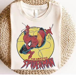マーベル アメイジング・スパイダーマン ヴィンテージ ジャンプロゴ シャツ、ディズニーランド ファミリーお揃いシャツ、マーベルコミックシャツ、WDW エプコット テーマパーク シャツ 画像 1