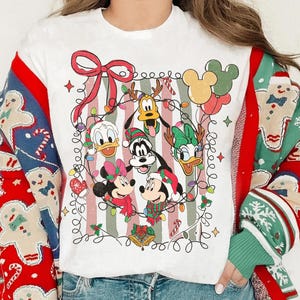 May include: A rustic wooden sign with the text "Welcome to our home" in white lettering. The sign features a distressed finish and a simple, inviting design, perfect for a front porch or entryway.