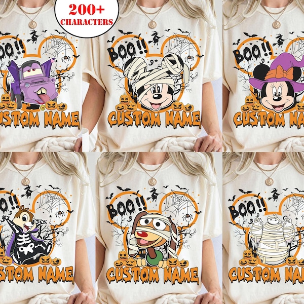 May include: A collection of six off-white t-shirts featuring various Halloween-themed cartoon characters, including a vampire truck, a mummy mouse, a witch mouse, a skeleton chipmunk, a mummy dog, and a mummy robot, with the text BOO! and CUSTOM NAME.