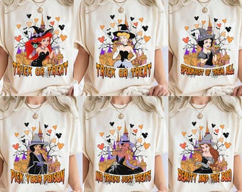 May include: Cream-colored t-shirts with Halloween-themed graphics. Each shirt features a cartoon princess with a witch hat, castle, and text: "Trick or Treat", "Spookiest of Them All", "Pick Your Poison", "No Tricks Just Treats", and "Beauty and the Boo".