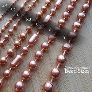 Copper ball chain displayed different way to wear, such as necklace, bracelet, anklet and waist beads