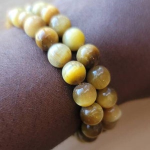 8mm Goldenes Tigerauge Kristall Perlen Armband, dehnbares handgemachtes Energie Balancing Edelstein Armband, echter Naturstein Schmuck