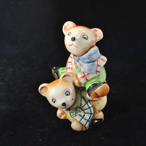 Charming Napco bears dressed in plaid salt and pepper shakers, collectible, vintage, bears playing leapfrog