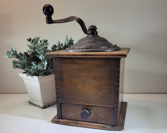 Antique coffee grinder, decorative cast iron top, wood box base, Strobridge  Patent Mill