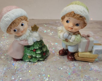 Christmas girl and boy figurines, collectible, Christmas display pieces, holiday decor, presents, tree, Homco
