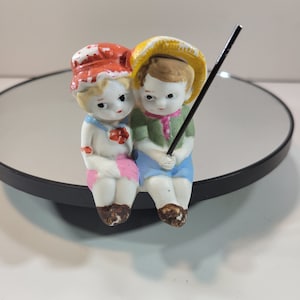 Brother and sister bisque penny dolls go fishing, Frozen Charlottes, 2 dolls in one figurine
