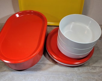 Ingrid stacking dishes, replacement pieces, Oblique tray, Ingrid lidded bowl, red, white, and yellow plastic dishes