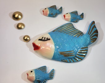 Blue and gold chalkware fish grouping of 7, Mama fish, 3 baby fish, and bubbles wall décor, ceramic, vintage, bathroom décor