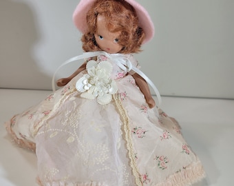 Red haired Nancy Ann doll, "Pretty Maid", painted eyes, bisque doll, frozen legs, collectible, pink floral dress