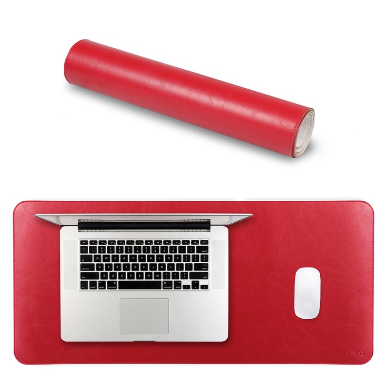 May include: Red leather desk mat rolled up, showing the inside of the roll. The mat is unrolled and flat on a desk with a laptop computer and a white mouse on top of it. The mat has the word "LOSODO" printed in the bottom right corner.
