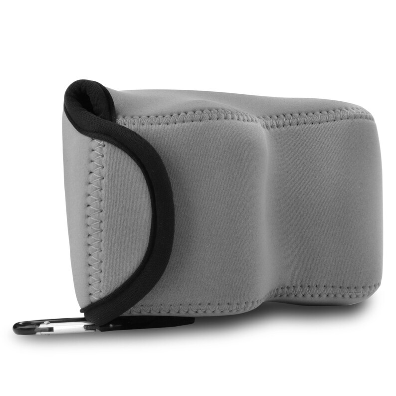 May include: Grey camera case with a black zipper and a black strap. The case has a soft, padded interior to protect your camera.