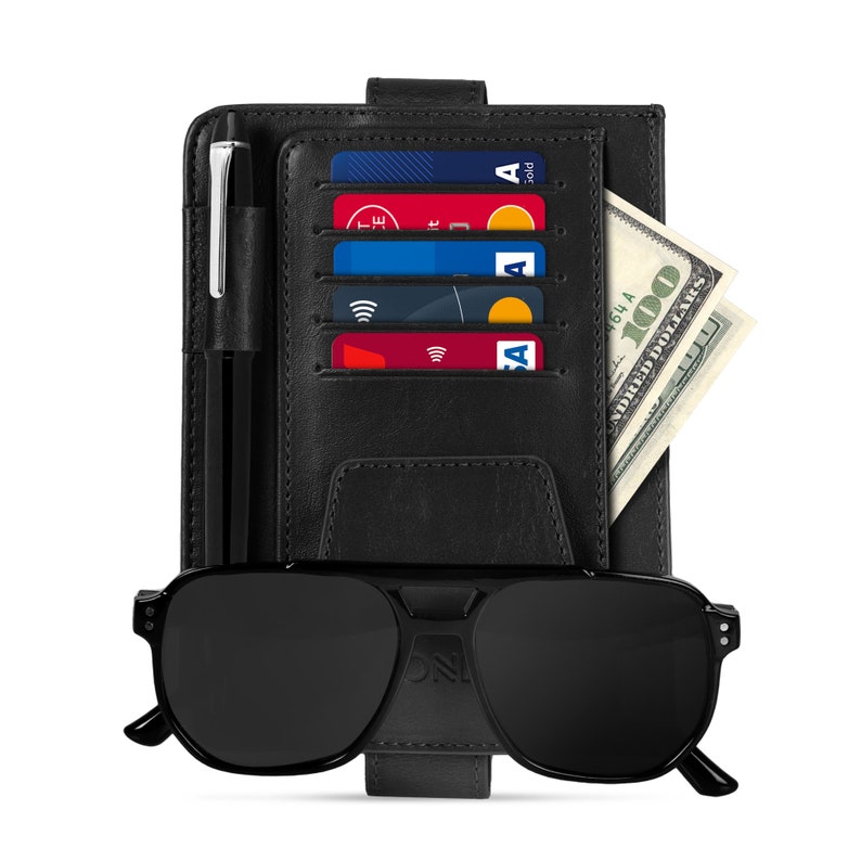 May include: Black leather wallet with multiple card slots, a pen holder, and a cash pocket. The wallet also has a built-in sunglass holder.
