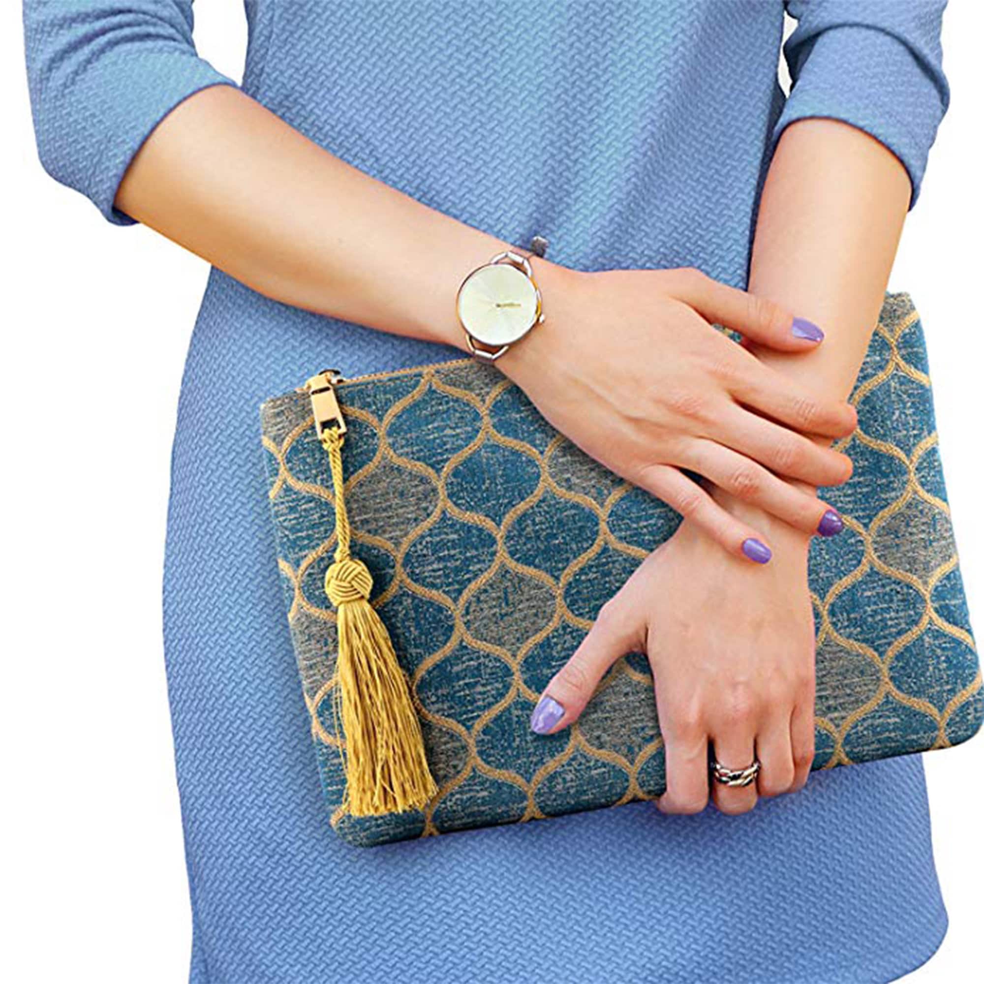 designer clutch bag with wrist strap