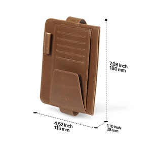 May include: Brown leather car visor organizer with multiple card slots, a pen holder, and a large pocket. It measures 7.08 inches tall, 4.52 inches wide, and 1.10 inches deep.