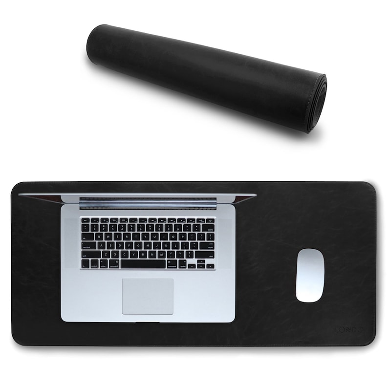 May include: Black leather desk mat with a laptop and mouse on top. The mat is rolled up in the top image.