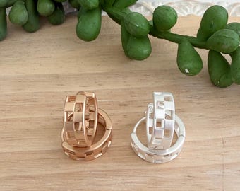 Indy 500 earrings - checkered cutout huggie hoop earrings in matte silver and gold
