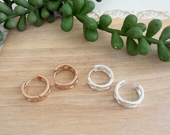 Indy 500 earrings - checkered cutout huggie hoop earrings in matte silver and gold