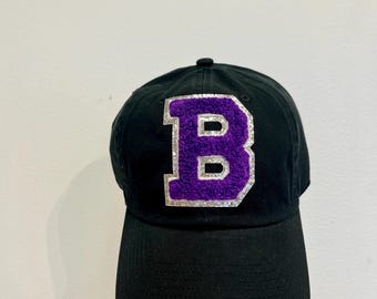Black, purple and white baseball hat with B patch, Brownsburg