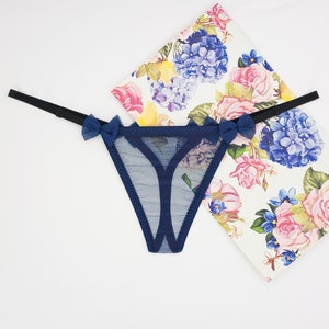 Transparent women&#39;s thong panties made of soft tulle mesh in blue color. All sizes available XXS, XS, S, M, L, XL, 2X, 3X, 4X, 5X