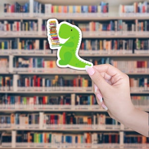 Sticker dinosaurus met boeken: waterdichte laptopsticker