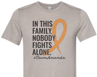 Leukemia Cancer Awareness, Orange Ribbon, In This Family Nobody Fights Alone, Leukemia Cancer Shirt, Orange Cancer Ribbon, Unisex Fit
