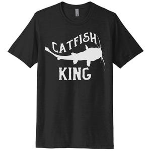 May include: Black t-shirt with a white silhouette of a catfish and the text "Catfish King".