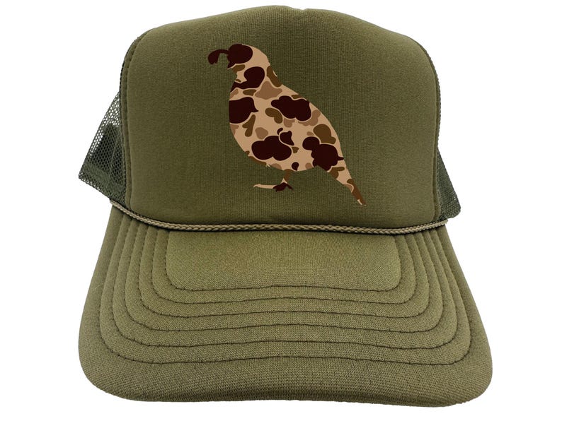 May include: A green trucker hat with a camouflage quail design. The hat has a mesh back and a curved brim.