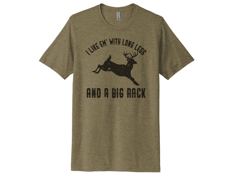 May include: A green t-shirt with a black deer silhouette and the text "I like 'em with long legs and a big rack".