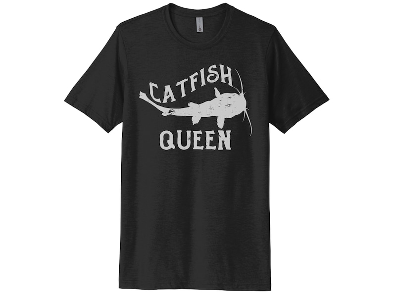 May include: Black t-shirt with a white graphic of a catfish and the text "Catfish Queen".