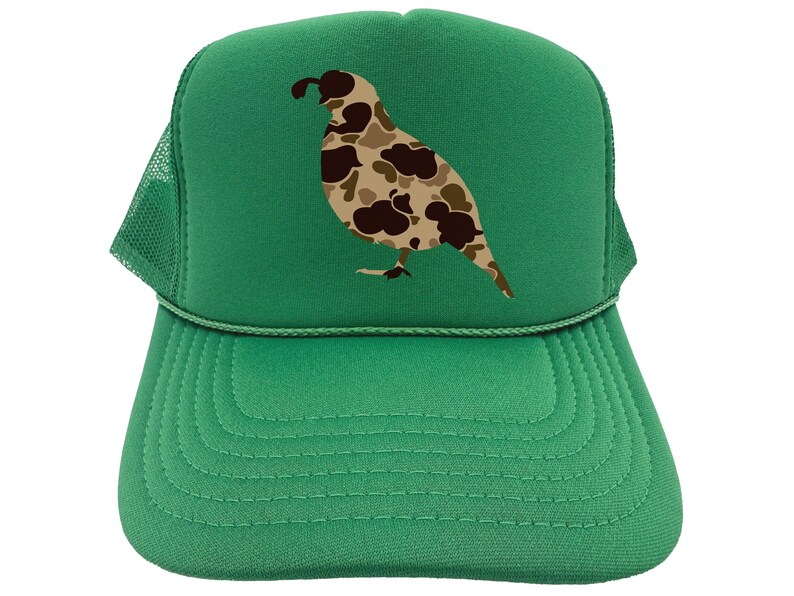 May include: A green trucker hat with a camouflage quail design. The hat has a mesh back and a green front.