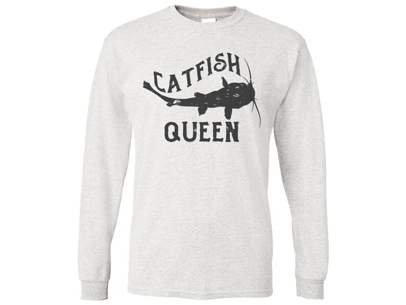 May include: A grey long-sleeved t-shirt with a black silhouette of a catfish and the text "CATFISH QUEEN".