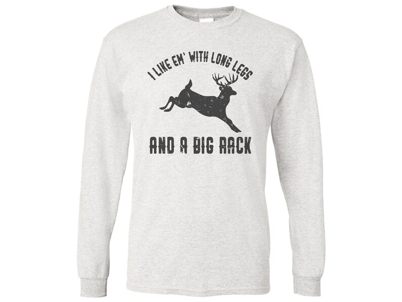 May include: A gray long-sleeve t-shirt with a black deer silhouette and the text "I like 'em with long legs and a big rack".
