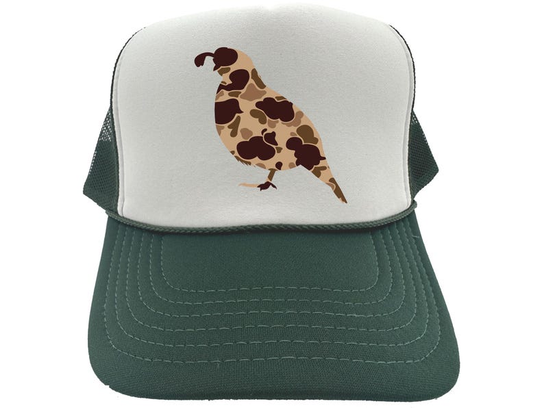 May include: A white and green trucker hat with a camouflage quail design. The quail is brown, tan, and black.
