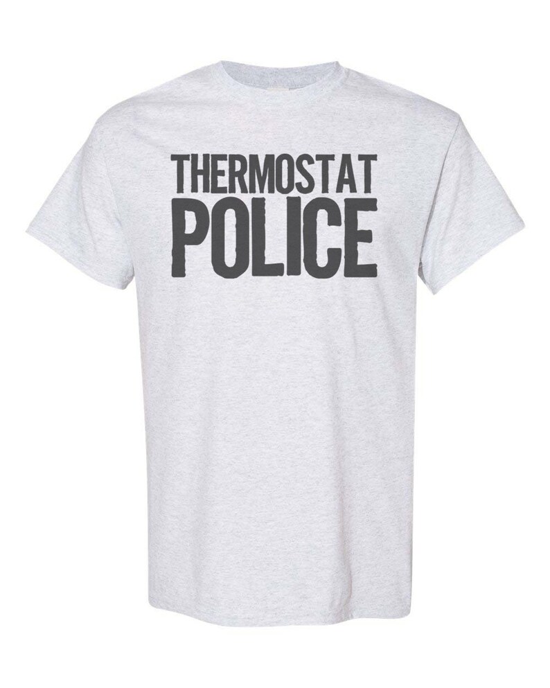May include: A light grey t-shirt with the text "THERMOSTAT POLICE" printed in black.