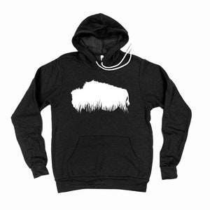 May include: A black hoodie with a white graphic of a bison silhouette above a line of grass. The hoodie has a drawstring hood and a front pocket. The long sleeves are visible.