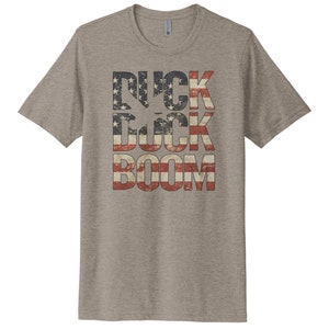 Camicia da caccia alle anatre, USA Duck Duck Boom, Camicia per uccelli acquatici, Camicia da caccia, Regalo per gli uomini, T-shirt patriottica, Caccia agli uccelli acquatici, T-shirt da cacciatore di anatre HEATHER STONE