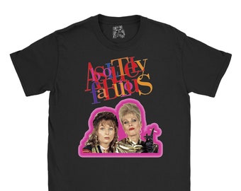May include: Black t-shirt with a pink graphic of two women. The text "Absolutely Fabulous" is printed in colorful letters above the graphic.