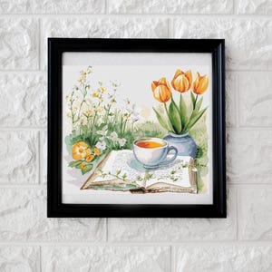 May include: A framed watercolor print featuring a still life scene. The artwork depicts a cup of tea, an open book, and a vase of orange tulips. Wildflowers and greenery are also present, creating a serene and inviting composition.
