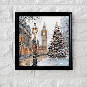 Könnte beinhalten: Ein Gemälde von Big Ben in London mit einem Weihnachtsbaum im Vordergrund. Das Gemälde ist in Schwarz gerahmt und hat einen weißen Hintergrund.