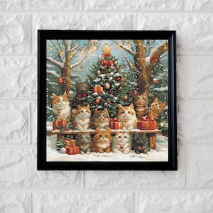 Puede incluir: Una impresión enmarcada con temática navideña que presenta una escena festiva con un árbol de Navidad decorado y varios gatos. Los gatos, de varios colores, están colocados frente al árbol y en un banco, rodeados de regalos envueltos y un fondo invernal nevado.