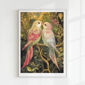 May include: A framed watercolor print featuring two colorful birds perched on a branch. The birds have pink, yellow, and green plumage with intricate details. The background is a lush, green foliage with hints of berries, creating a serene and natural scene.
