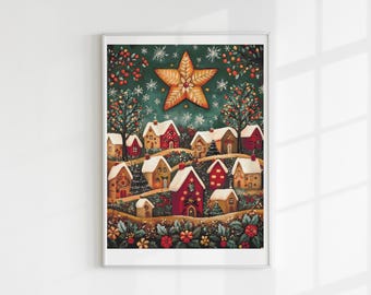 Puede incluir: Una impresión enmarcada que presenta una escena navideña caprichosa de un pueblo. La obra de arte representa casas cubiertas de nieve en tonos de rojo, dorado y marrón, ubicadas en una colina debajo de una gran estrella y un cielo verde oscuro con copos de nieve.