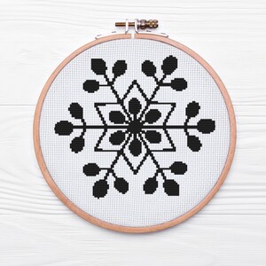 Basic snowflake cross stitch pattern PDF
